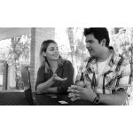 Photo of two people having conversation